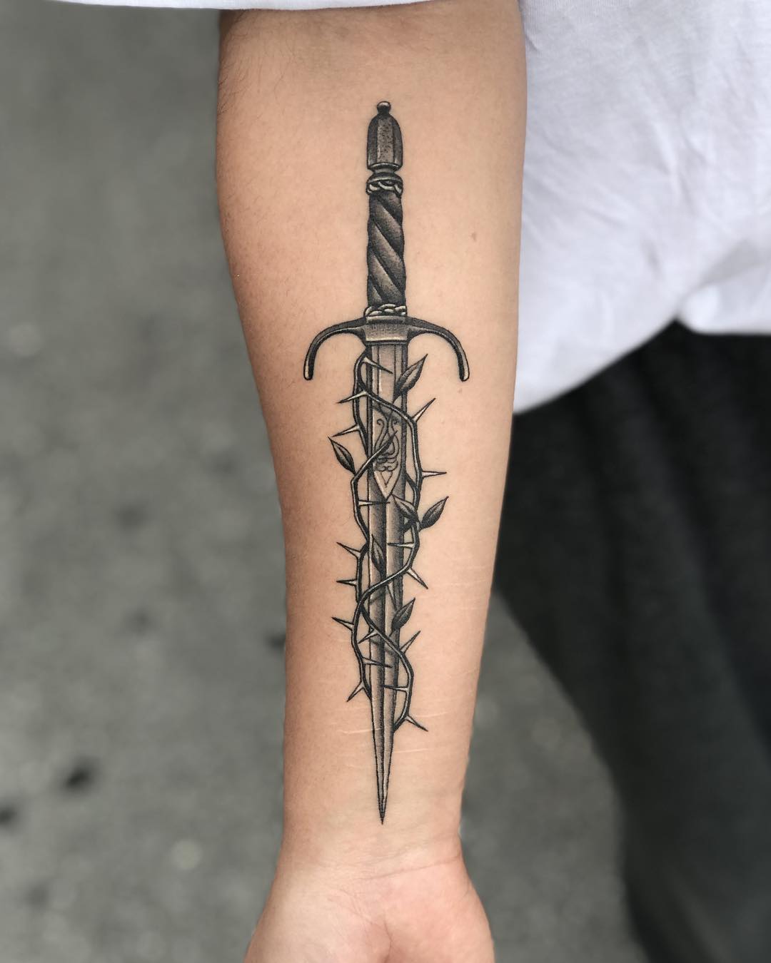 Dagger and thorns tattoo by Javier Betancourt