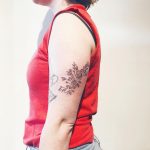 Deconstructed bouquet tattoo by Kelli Kikcio