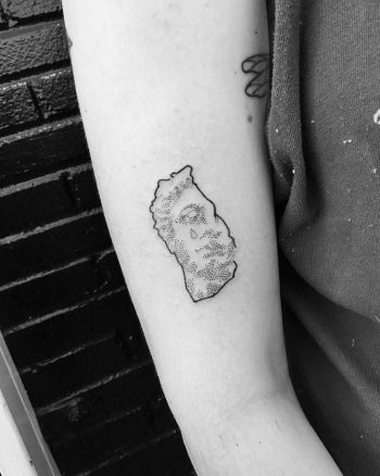 Dotty crying sculpture tattoo by Robbie Ra Moore