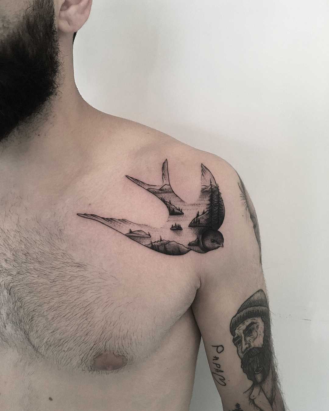 Double exposure swallow and scenery by tattooist Spence @zz tattoo