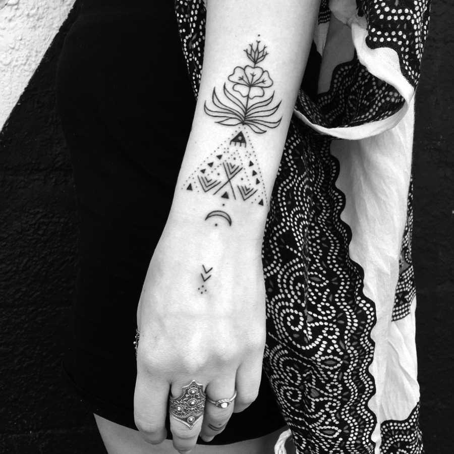 Evening primrose tattoo by Nadia Rose