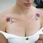 Flowers on clavicle bones by tattooist picsola