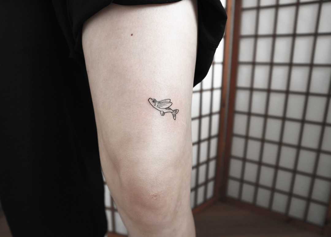 Flying Fish tattoo by Ann Gilberg
