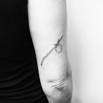 Hand-poked bindle tattoo by Kelli Kikcio