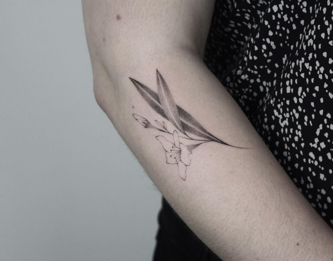 Hand-poked oleander tattoo by Lara Maju