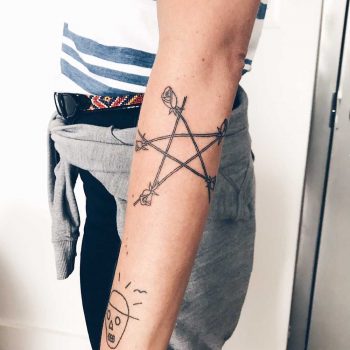 Hand-poked wrapped rose pentagram by Kelli Kikcio