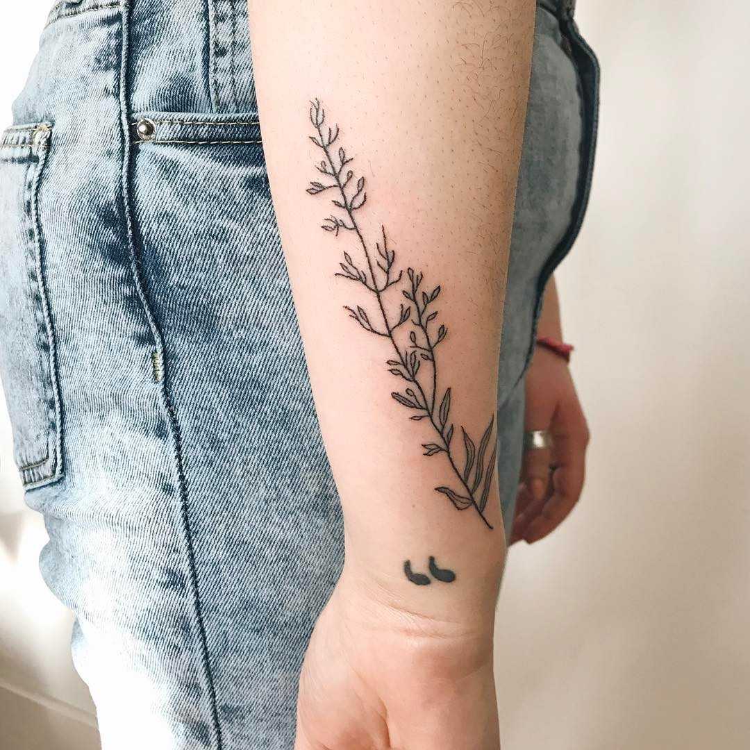 Hand-poked wrapping branch tattoo by Kelli Kikcio