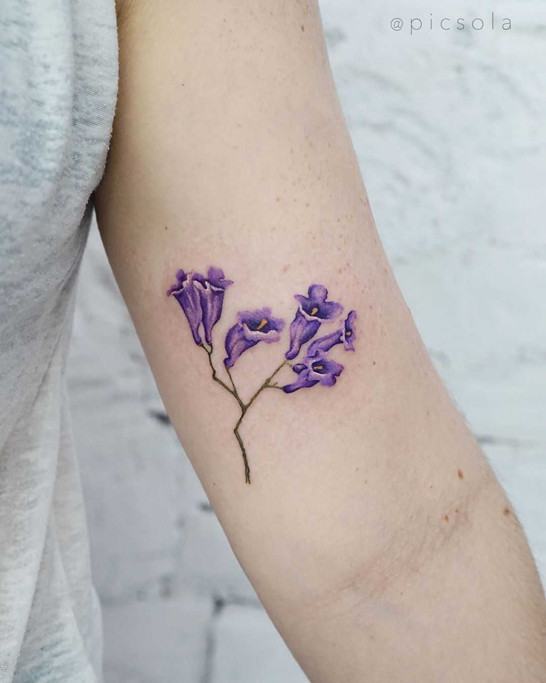 Jacaranda flowers tattoo by tattooist picsola