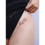 Little rose tattoo on a hip by Zaya Hastra