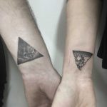 Matching mountain tattoos by Gianina Caputo