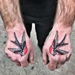 Matching swallow tattoos by Mike Nofuck