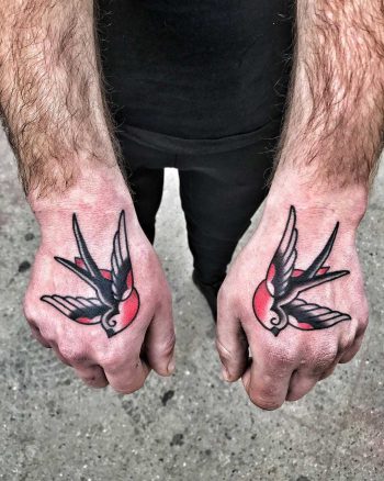 Matching swallow tattoos by Mike Nofuck