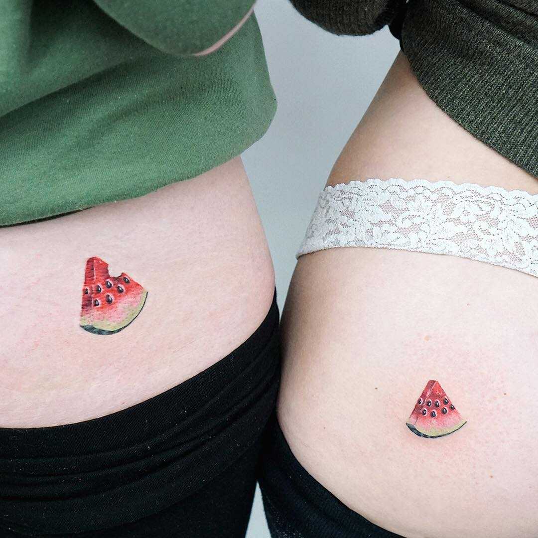 Matching watermelon tattoos by tattooist picsola
