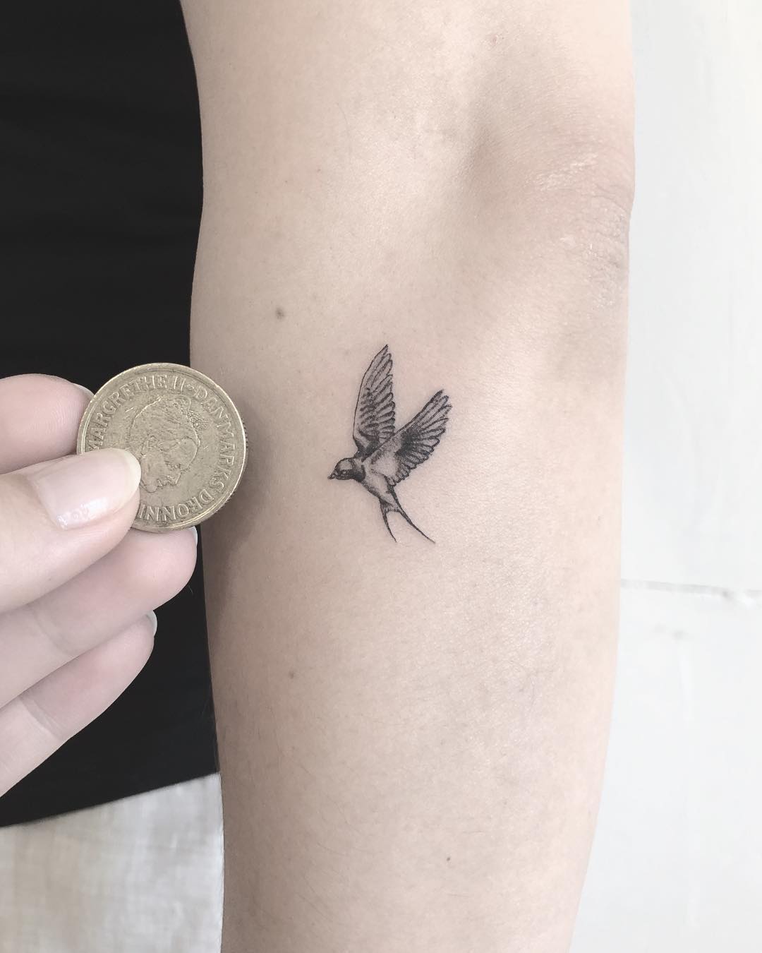Micro swallow tattoo Annelie Fransson