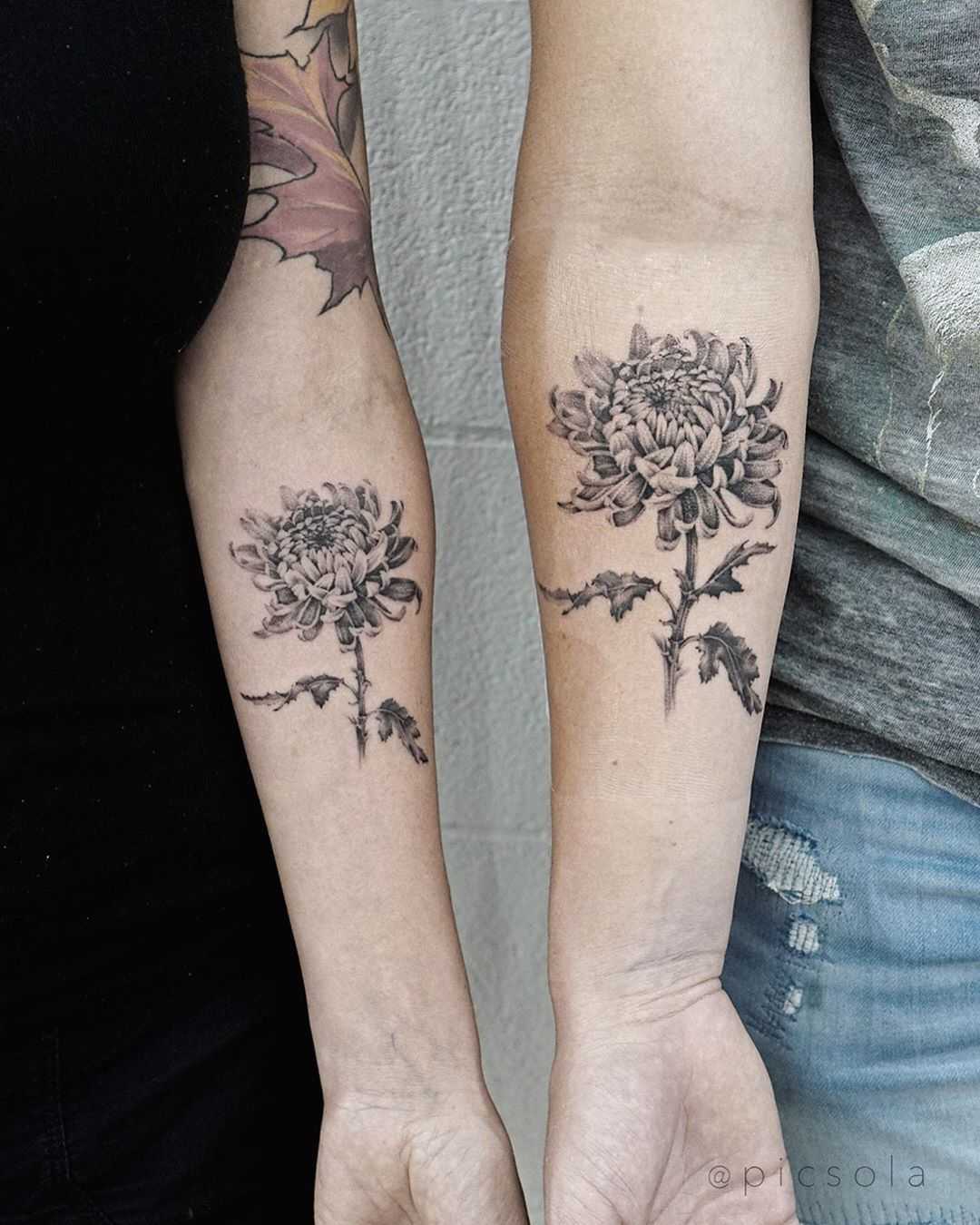 Mom and son matching flower tattoos by tattooist picsola
