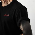 Negative space words sleeve tattoo by Philipp Eid