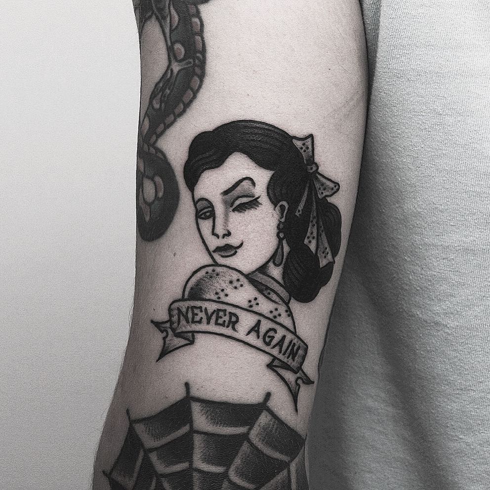 Never again tattoo by Krzysztof Szeszko
