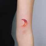 Orange moon tattoo by tattooist Nemo