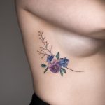 Pansy, Hydrangea, and Baby's-breath tattoo by Rey Jasper