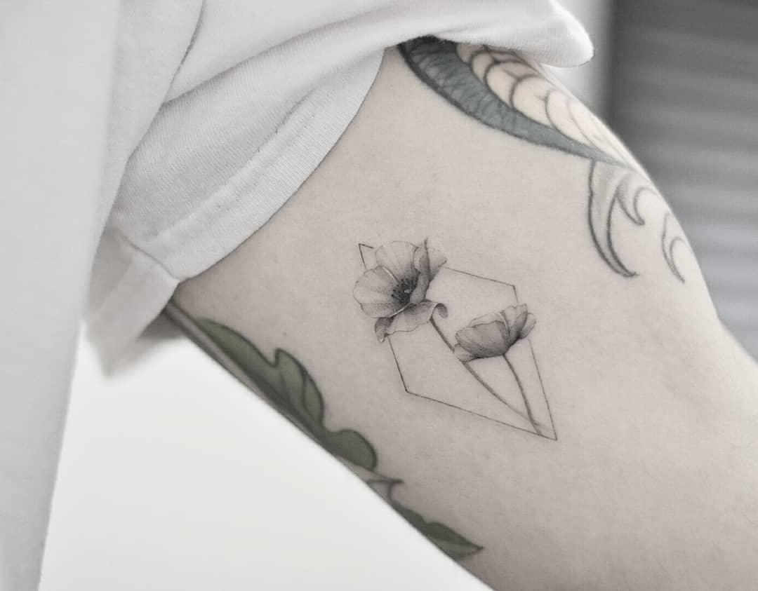 Poppy tattoo by Dragon Ink
