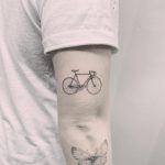 Realistic single-speed bicycle tattoo by Annelie Fransson