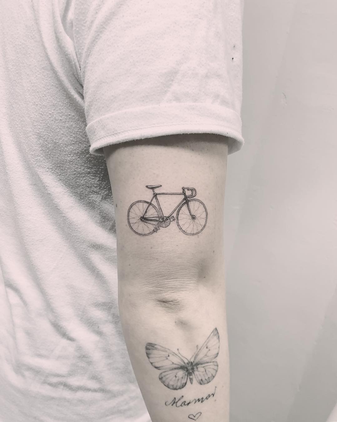 Realistic single-speed bicycle tattoo by Annelie Fransson