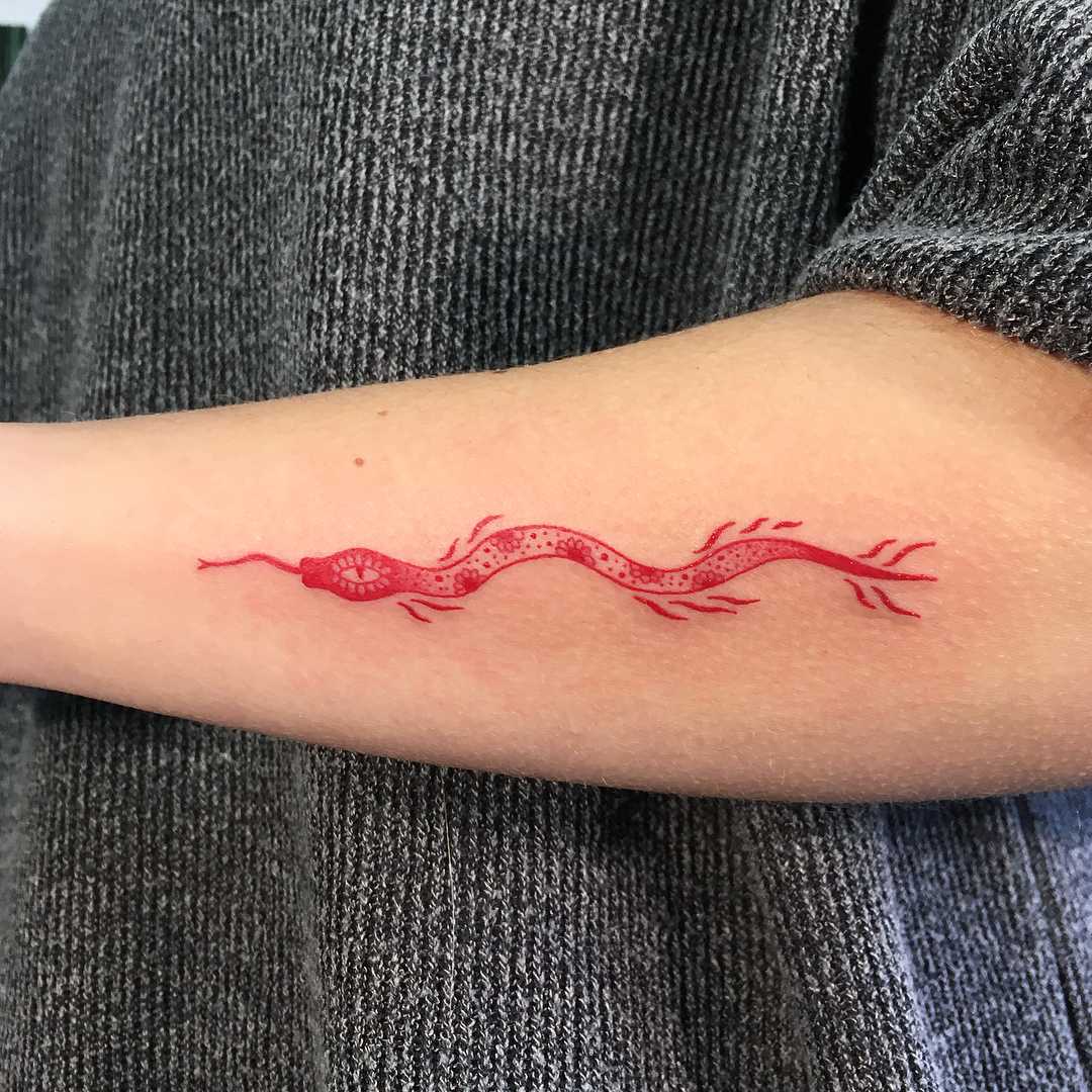Red snake tattoo by Agata Agataris