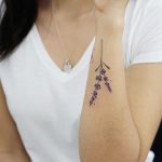 Small lavender tattoo by tattooist picsola