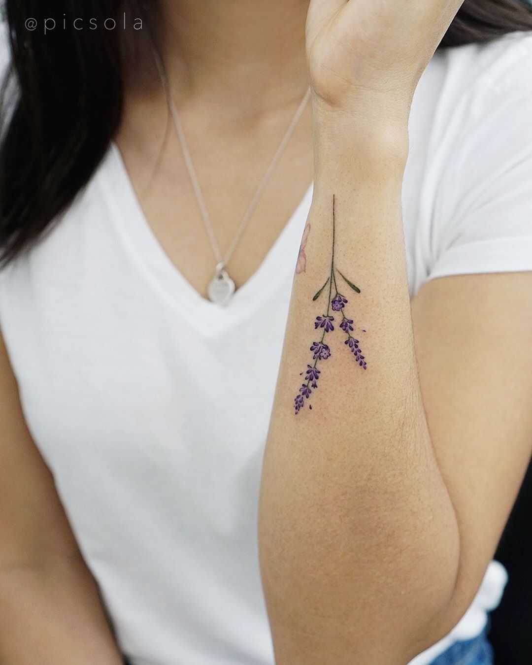 Small lavender tattoo by tattooist picsola