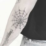 Spider web tattoo by Annelie Fransson