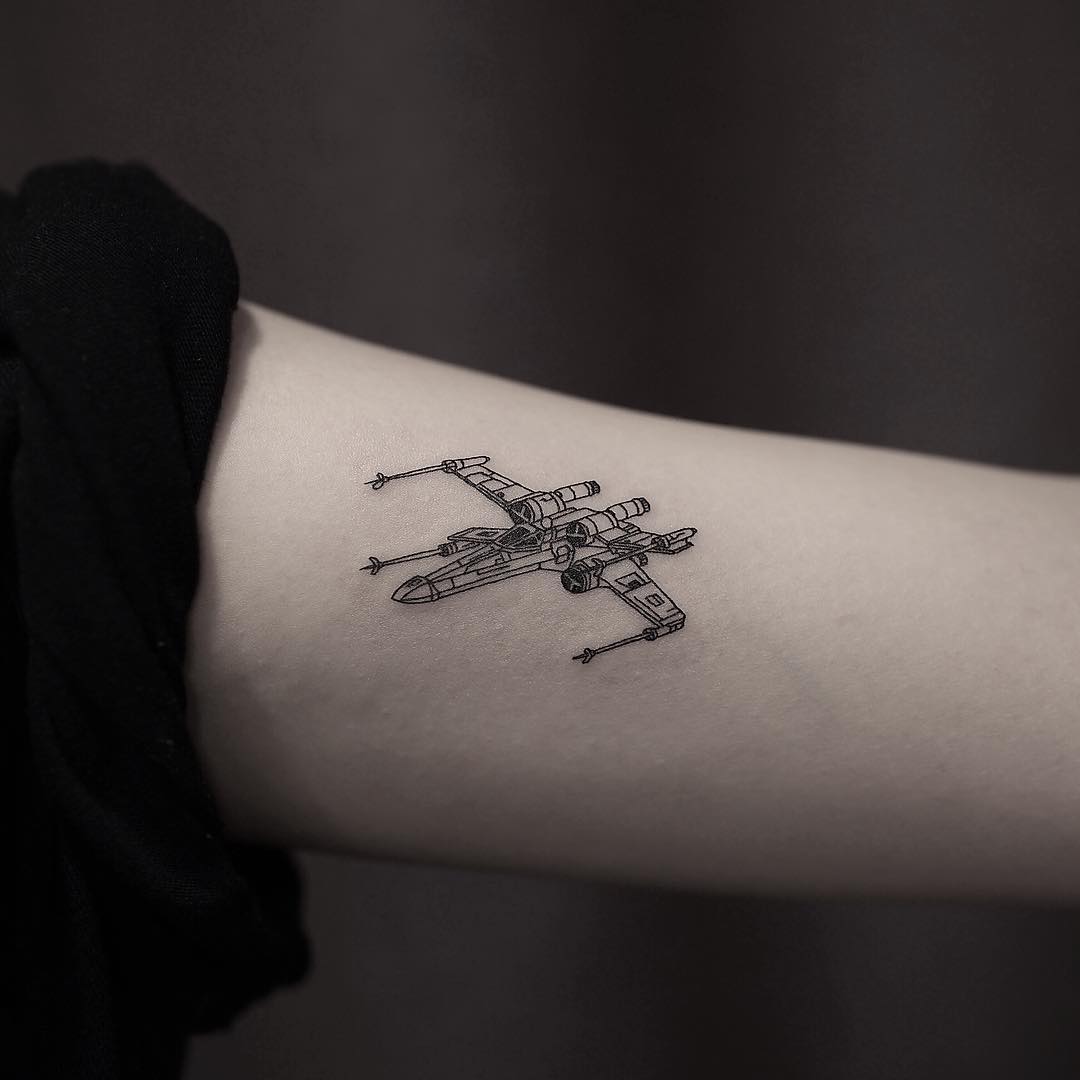 Starwars X-Wing tattoo by Nudy tattooer