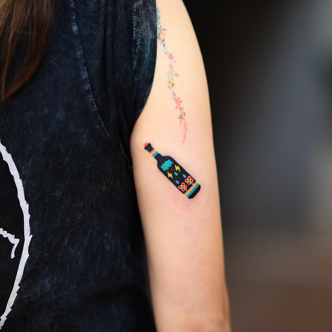 Tiny colorful bottle tattoo by zzizziboy
