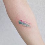 Tiny jellyfish tattoo by tattooist Nemo