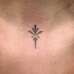 Tiny symbol on a neck by Kirk Budden