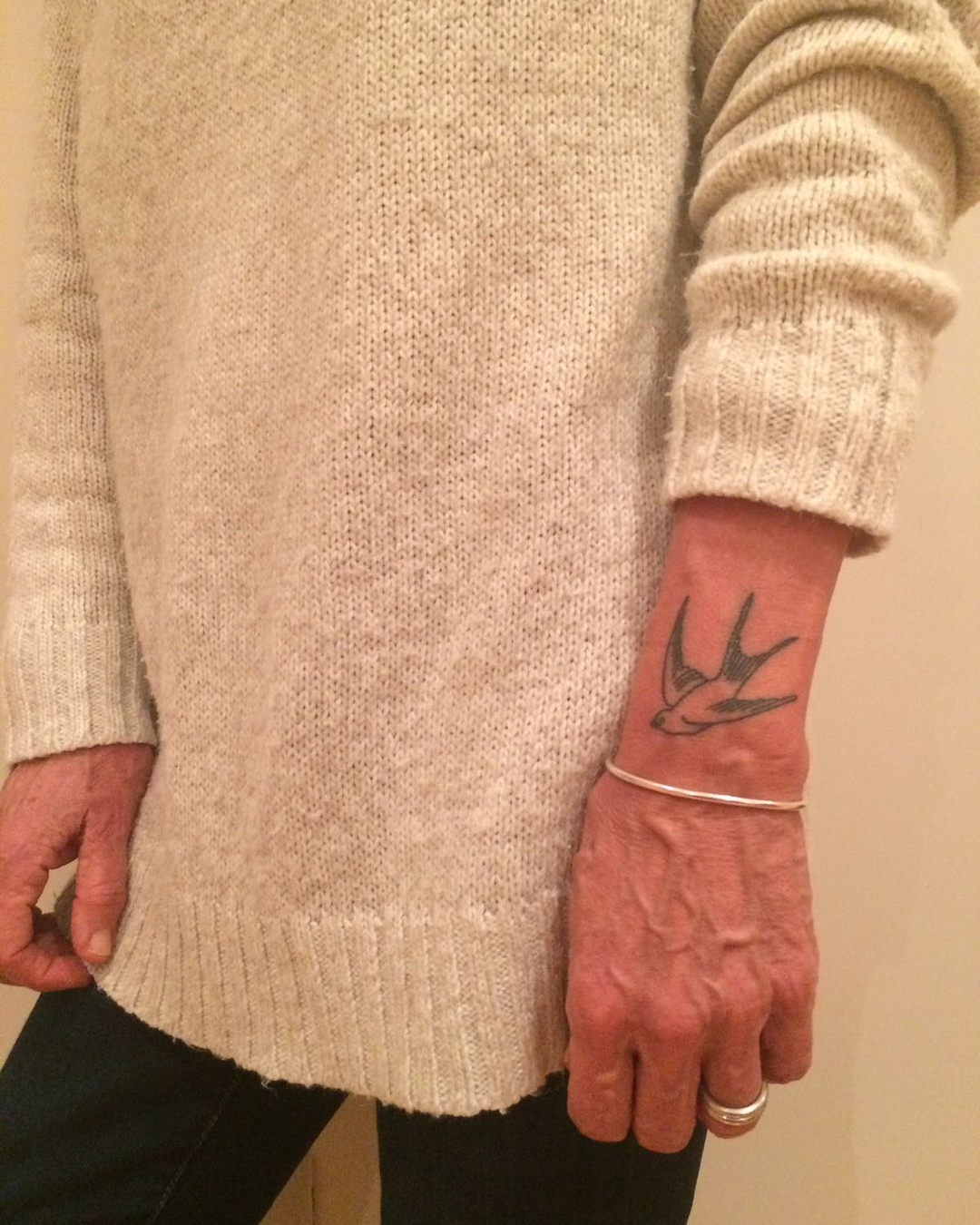 Traditional swallow on the wrist by Kirk Budden