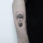 Tree in a light bulb by Jakub Nowicz