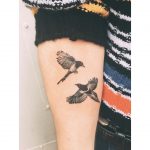 Two joyful magpies tattoo by Zaya Hastra