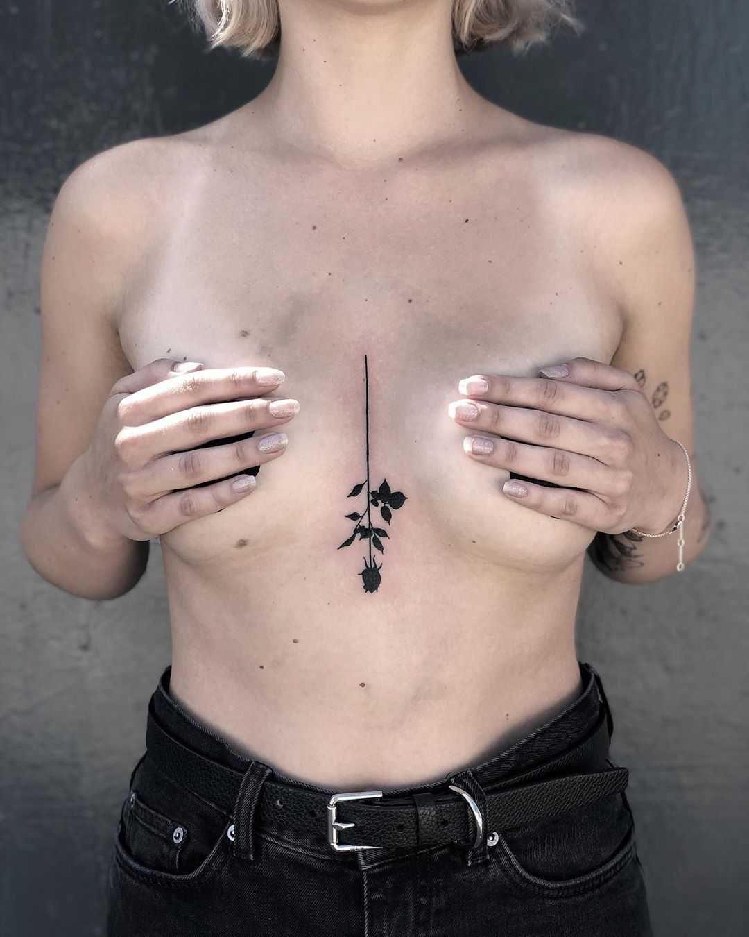 Upside down black rose tattoo by Loz McLean