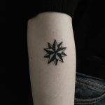 Black and white star by tattooist yeontaan