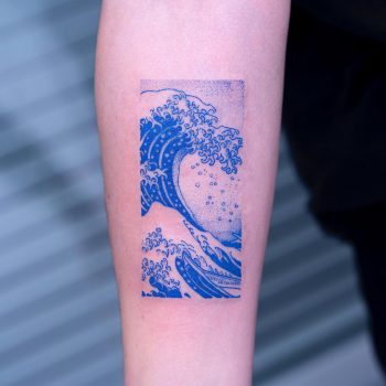 Blue wave tattoo by tattooist Oozy