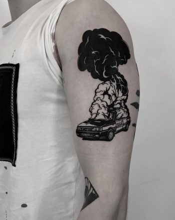 Burning car tattoo by Krzysztof Szeszko