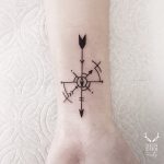 Compass and arrows by Nudy tattooer