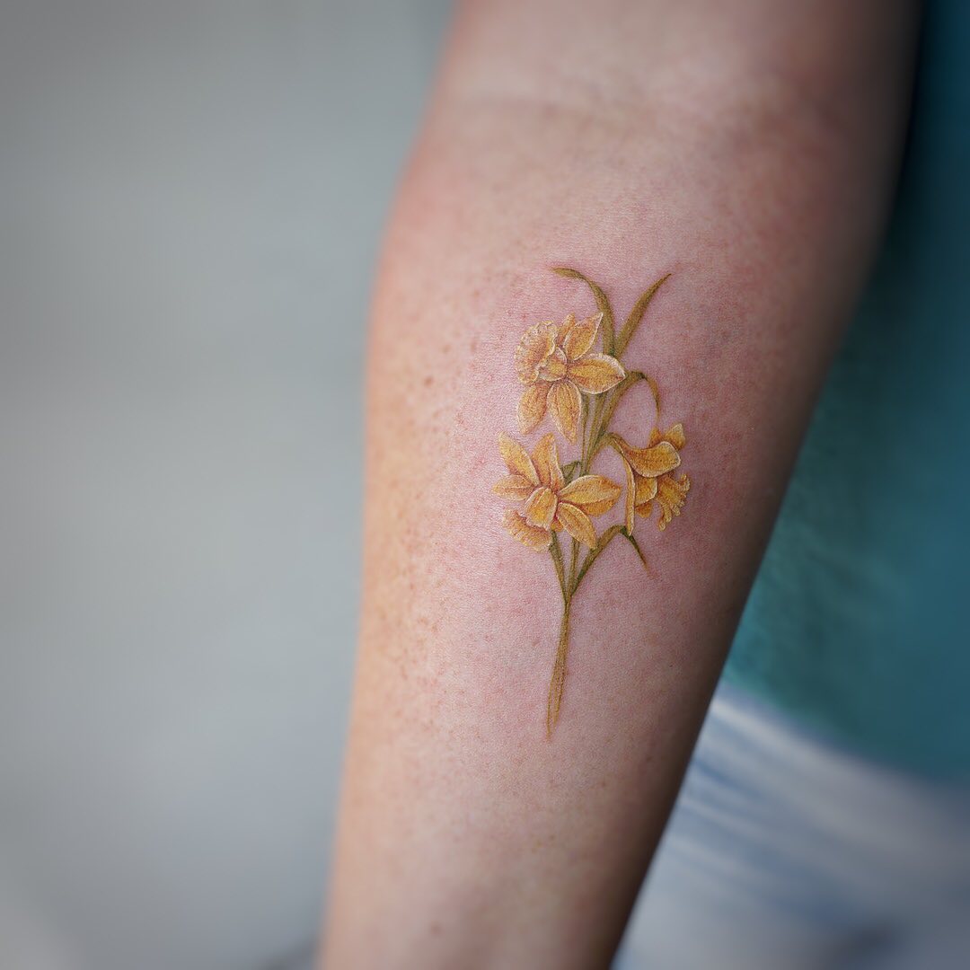 Daffodil tattoo by tattooist  