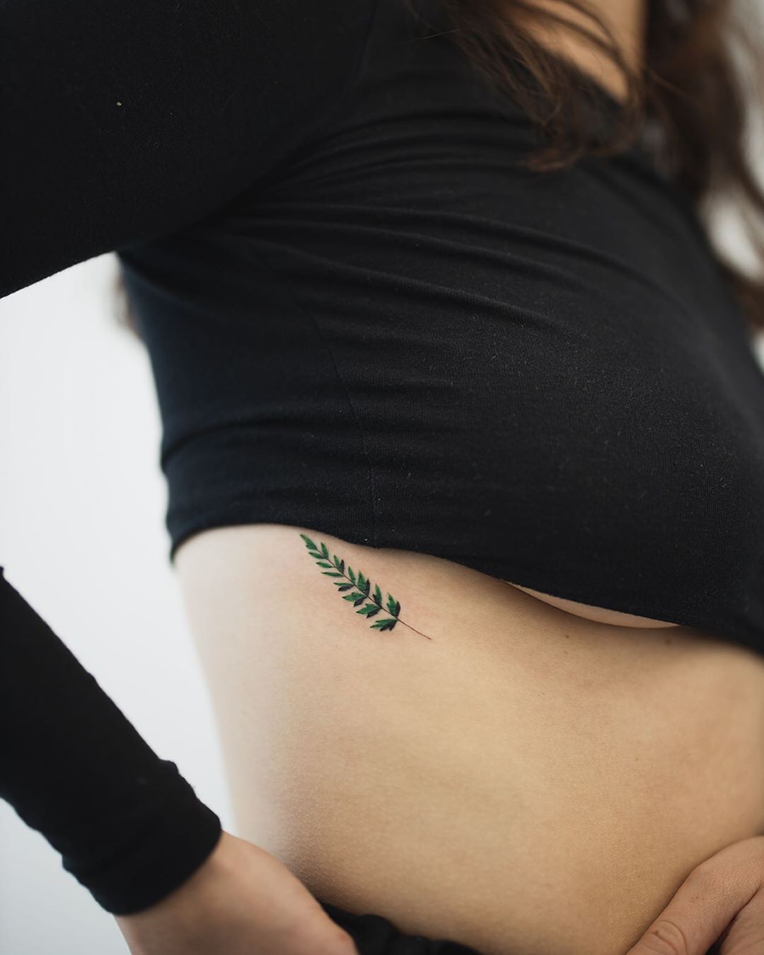 Dainty fern tattoo by Rey Jasper 