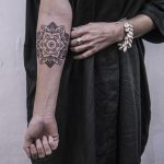 Fineline mandala tattoo by Remy B