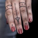 Finger tats by Remy B