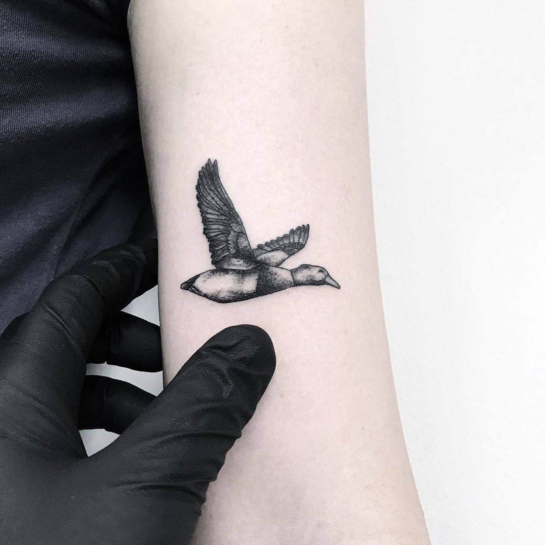 Flying goose tattoo by Loughie Alston