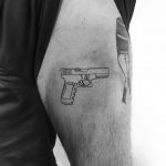 Glock tattoo by Philipp Eid