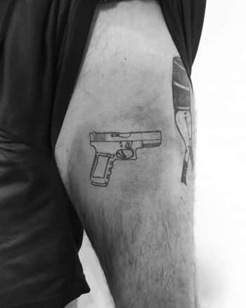 Glock tattoo by Philipp Eid