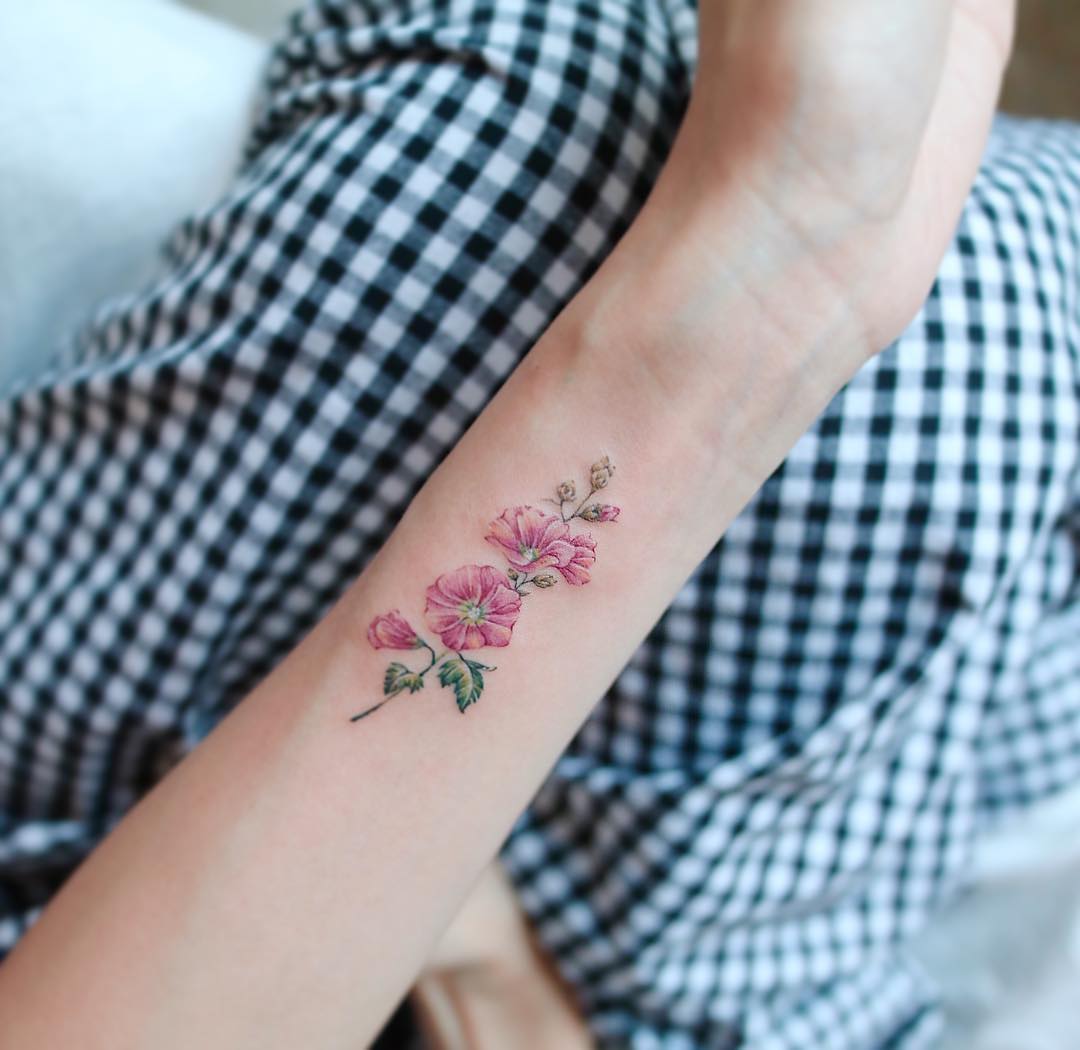 Hollyhock tattoo by tattooist Nemo